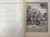 an open book with a picture of a man on a horse