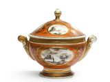 un grand bol orange et blanc orné d'une horloge