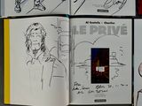 several pages of a book with a drawing of a man holding a tennis racquet