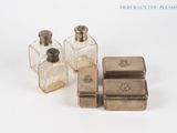 three small silverplated bottles and a small silverplated box