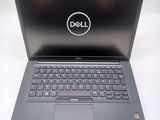 the dell laptop is open and ready to be used