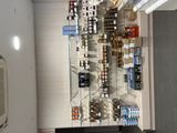 many bottles of wine on display in a store