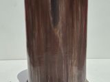 a vase that is sitting on a white table