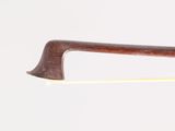 the bow of the violin is made of wood and has a curved handle