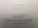 a close up of a piece of paper with a black and white image