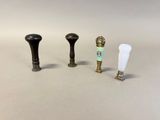 three different types of knobs on a white surface