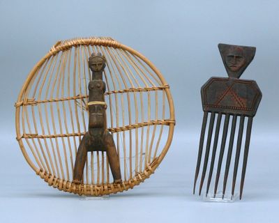 two wooden objects that are sitting next to each other