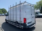 a white van that is parked in a parking lot