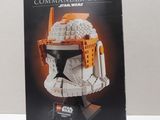 a box of lego star wars clone commander cody ' s helmet