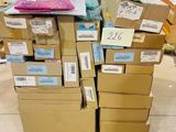 a pile of boxes on a pallet in a room