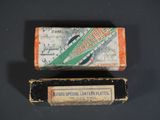 an old box of toothpaste sitting on top of a table