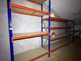 a long shelf in the middle of a room