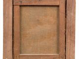 an old wooden picture frame with a piece of paper taped around it