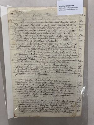a piece of paper with writing on it sitting on a table