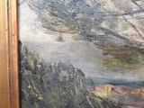 a picture of a painting of a landscape in a wooden frame