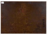 an image of a piece of rusted metal with the word x on it
