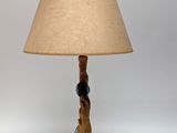 an image of a lamp with a wooden base and a lamp shade