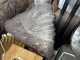 a pile of furniture that has been wrapped up and ready to be shipped