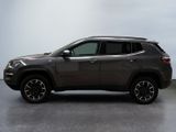 the jeep compass is parked in a large room with a white wall