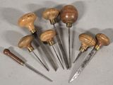several different types of woodworking tools are arranged on a table