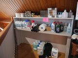 many bottles of water on the shelves in the room