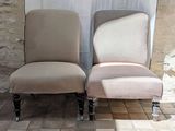 two chairs that are sitting next to each other