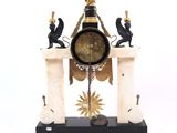 a clock that is sitting on top of a table