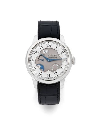 une image d'un gros plan d'une montre-bracelet sur un fond blanc
