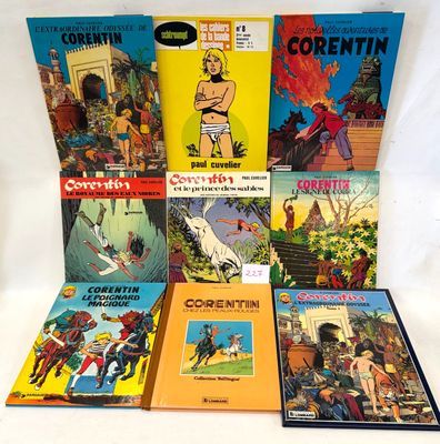 a lot of comic books sitting on a white surface