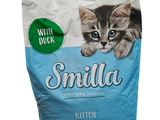 a bag of cat food that is sitting on a table