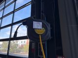 a yellow hose attached to the side of a building