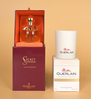 une photo d'un flacon de parfum Guerlain à côté d'un coffret