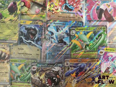 a lot of pokemon cards that are on the table