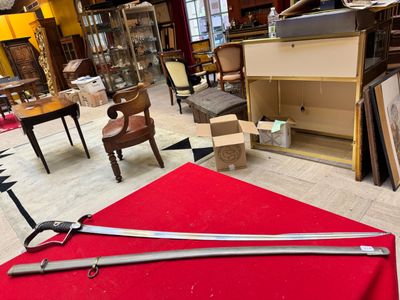 a large pair of scissors on the floor in a room