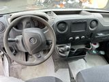 dashboard of a car with a steering wheel and dashboard controls
