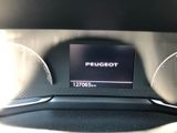 the dashboard of a car with a digital display in the center