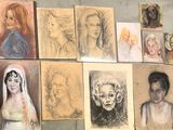 many different colored drawings on the wall of this room