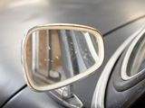 a close up of a car ' s side view mirror
