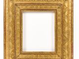 a gold picture frame on a white background