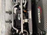 a close up view of a motorcycle engine in a plastic bag