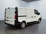 a white van that is parked in a room