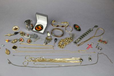 many different types of jewelry on the table