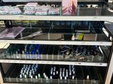 a display of nail polish bottles in a store