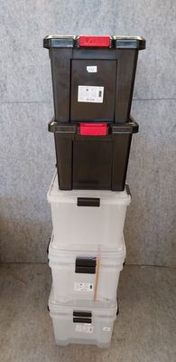 three boxes stacked on top of each other on the floor