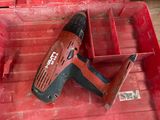 a red tool box with a drill and a hammer in it