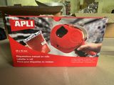 an open box of a red blower sitting on top of a table