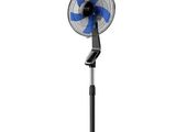a black and blue fan sitting on top of a metal stand
