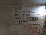 a label on the back of a refrigerator door