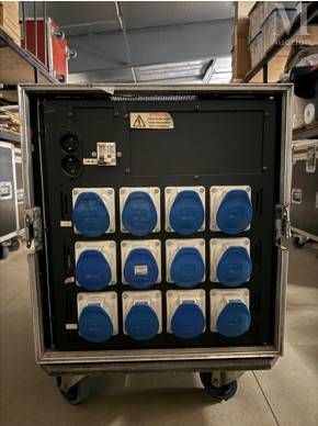 an image of a cart with blue discs in it