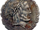 Gros plan sur une pièce de monnaie portant le visage d'un homme